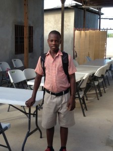 Johnny getting ready to head to school.