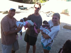 Tony, Jonathan, and Katelyn all loving on the new babies we found while on our walk through the village.