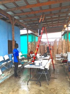 Phillip & Matthew putting up fans in the breezeway.