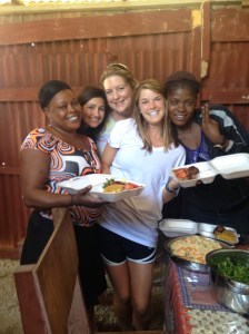Kelly, Leyna, and Macey with Marie Francis and Yvnante making plates for the pastors' conference.