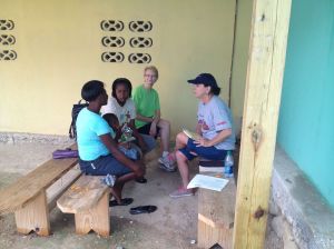 Jane & Barbara talk with the first mother to arrive at the motherhood seminar. Translator JuJu was a tremendous help at the seminar. 