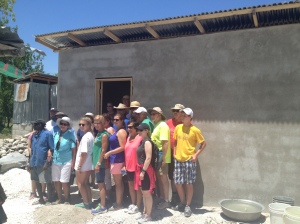 Beersheba Pres Team in front of the house they built for a family in our village